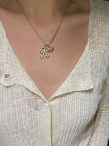 1 mặt dây chuyền hình trái tim đính đá Cubic Zirconia, thiết kế 26 chữ cái tiếng Anh, mặt dây chuyền cổ điển, phù hợp để đeo hàng ngày hoặc trong các buổi tụ họp, món quà lý tưởng cho Ngày Valentine. - Vàng - Xem 6