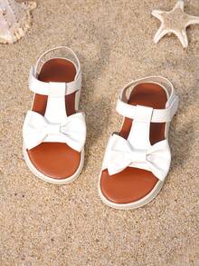 1 Pair Of Girls' Shoes With White Bow And Thick Sole Sandals, Featuring A Three-Dimensional Bow Design On The Upper And A Low Cut Design With Exposed Toes. The Thick Sole Is Soft And Fashionable, Making It Suitable For Holiday Family Gatherings And Daily School Trips - White - View 8