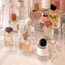 1 قطعة رف تنظيم شفاف من الأكريليك للمكتب، رف تخزين متعدد الوظائف للدمى اليدوية والعطور والمستحضرات التجميلية والإكسسوارات. رف تخزين أكريليك يمكن استخدامه لتنظيم الدمى وعناصر المكتب وأرفف عرض الألعاب المتدرجة وتخزين وعرض العناصر الصغيرة. - شفاف - مشاهدة 3