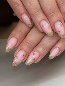 10片手工制作的杏仁形金色闪粉法式美甲贴纸，饰以手绘金色水钻和金色星芒。优雅浪漫又不失简约，这款美甲贴纸套装展现出奢华、性感、轻盈的高级美感。适合日常佩戴、约会、音乐会和轻度商务场合，是送给女性和女孩的绝佳礼物。 - 彩色 - 查看 12