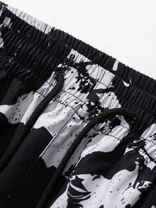 男士随机泼墨印花工装裤，宽松抽绳阔腿裤，多口袋设计，适合健身、锻炼、跑步、户外活动、休闲穿着，春秋季款。 - 黑色 - 查看 4