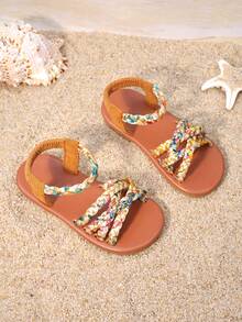 1双女童棕色编织凉鞋，鞋面采用彩色编织，弹性踝带贴合脚型，饰有流苏和搭扣，平底防滑，适合日常穿着、家庭出游和夏季购物。 - 亮橙色 - 查看 4