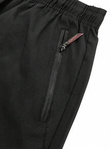 男士大码轻便透气休闲运动裤，带拉链口袋，适合日常休闲和户外穿着 - 黑色 - 查看 5