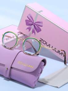 ZOVUJUMY Kính mắt ZOVULJUMY gọng oval đen vàng thanh lịch, tròng kính trong suốt, càng kính trang trí vàng, tròng kính màu xanh lam, phong cách cổ điển sang trọng, giúp khuôn mặt thon gọn, phù hợp cho việc đi làm và uống trà chiều. - Trong sáng - Xem 15