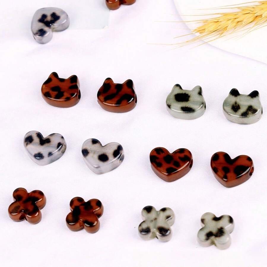 5/10颗塑料/树脂材质的波点、豹纹、花朵、心形珠子，适合DIY珠宝、手链/项链、手机挂绳等工艺品制作。