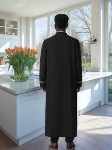 A Long Men's Arabian Robe With A Standing Collar The Fabric Is Skin Friendly And Soft, Suitable For Daily Occasions Such As Eid Al Fitr, Ramadan, Weddings, Etc