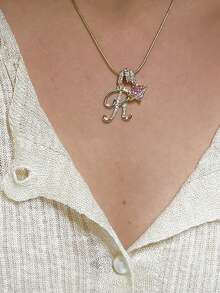 1 mặt dây chuyền hình trái tim đính đá Cubic Zirconia, thiết kế 26 chữ cái tiếng Anh, mặt dây chuyền cổ điển, phù hợp để đeo hàng ngày hoặc trong các buổi tụ họp, món quà lý tưởng cho Ngày Valentine. - Vàng - Xem 5