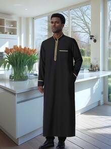 A Long Men's Arabian Robe With A Standing Collar The Fabric Is Skin Friendly And Soft, Suitable For Daily Occasions Such As Eid Al Fitr, Ramadan, Weddings, Etc