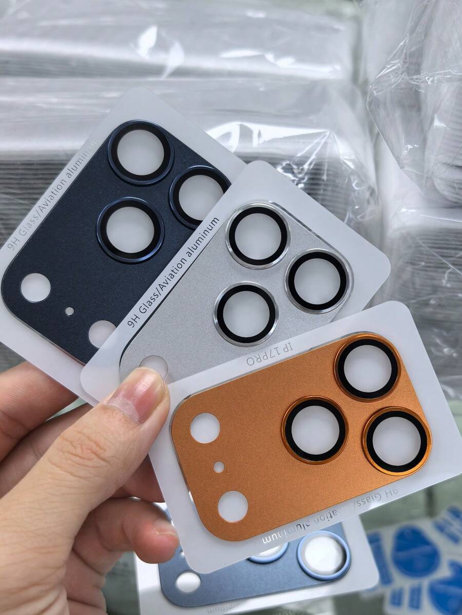 2 piezas Protector de lente de cámara compatible con iPhone 17 Pro Max - Vidrio templado premium 9H, adhesivo fuerte | Compatible con diseño de funda para teléfono, ajuste perfecto | Anti-arañazos, anti-huellas dactilares, anti-polvo | Protección de cobertura completa, previene arañazos e impactos | Cubierta de lente de alta transmitancia, mantiene la calidad de imagen original | Regalo ideal para familiares, amigos y entusiastas de la fotografía móvil en Halloween, disponible en naranja cósmico/plata/azul aplicable a Daily Shield, Oficina, Hogar Diario Escudo Oficina Hogar Cubierta de cámara de teléfono a prueba de agua a prueba de golpes resistente a arañazos - 2 piezas - Ver 1