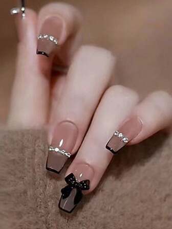 24 st. mellanlånga lösnaglar svarta franska metalliska kedja strass rosett nagelstickers + gelégel + nagelfil