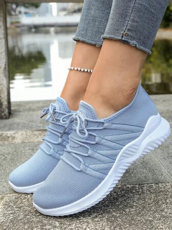 Unisex sommarstickade mesh casual sportskor, andningsbara lätta mjuka sular bekväma dagliga mångsidiga löparskor