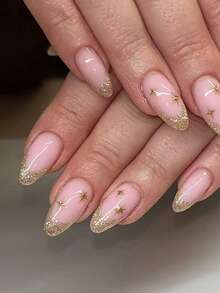 10片手工制作的杏仁形金色闪粉法式美甲贴纸，饰以手绘金色水钻和金色星芒。优雅浪漫又不失简约，这款美甲贴纸套装展现出奢华、性感、轻盈的高级美感。适合日常佩戴、约会、音乐会和轻度商务场合，是送给女性和女孩的绝佳礼物。 - 彩色 - 查看 10