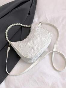 这款可爱百搭的斜挎包饰有蝴蝶结和珍珠，采用尼龙拉链和可调节肩带，适合日常使用、上学、旅行，可轻松收纳日常必需品。这款多功能单品时尚前卫，可轻松搭配各种风格和场合。 - 白色 - 查看 6