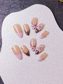 Bộ 10 miếng dán móng tay thủ công hình hạnh nhân màu nâu hồng kiểu Pháp, trang trí bằng chấm bi và họa tiết chạm khắc, điểm xuyết bằng hoa 5 cánh 3D màu hồng thủ công, chấm bi Pháp màu nâu hồng vẽ tay và các đường lượn sóng 3D. Thanh lịch và lãng mạn nhưng tối giản, bộ dán móng tay này toát lên vẻ sang trọng cao cấp, gợi cảm và nhẹ nhàng. Thích hợp cho sử dụng hàng ngày, hẹn hò, hòa nhạc hoặc các dịp kinh doanh, cũng là món quà hoàn hảo cho phụ nữ và các cô gái. - Nhiều màu - Xem 4