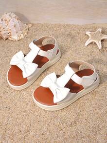 1 Pair Of Girls' Shoes With White Bow And Thick Sole Sandals, Featuring A Three-Dimensional Bow Design On The Upper And A Low Cut Design With Exposed Toes. The Thick Sole Is Soft And Fashionable, Making It Suitable For Holiday Family Gatherings And Daily School Trips - White - View 6