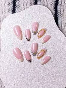 10片手工制作杏仁形乳白色斑马纹法式雕花美甲贴纸，饰以手工3D五瓣花和手绘斑马纹法式图案，并以3D金色圆圈和线条点缀。 - 彩色 - 查看 5