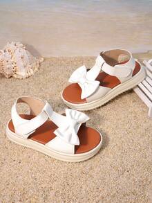 1 Pair Of Girls' Shoes With White Bow And Thick Sole Sandals, Featuring A Three-Dimensional Bow Design On The Upper And A Low Cut Design With Exposed Toes. The Thick Sole Is Soft And Fashionable, Making It Suitable For Holiday Family Gatherings And Daily School Trips - White - View 2