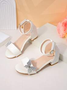 1 Pair Of White Glitter Girl's Sandals, Featuring A Shiny Upper With Adjustable Straps For A Snug Fit. Adorned With Rhinestone Butterflies And A Toe-Exposing Design, These Low-Heeled, Slip-Resistant Shoes Exude Delicate Fairy Charm, Perfect For Bridal Flower Girls Or Festive Evening Parties - Silver - View 1