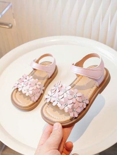 1 par de sandalias de niña con decoración de flores y rhinestones, suela gruesa antideslizante, estilo dulce y punta abierta, adecuadas para el hogar, uso casual y diario en la escuela