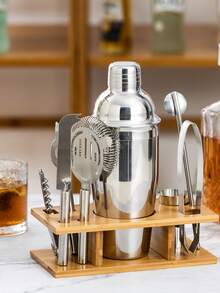 9件套不锈钢调酒工具套装，包括鸡尾酒摇壶、调酒杯和酒吧工具。 - 彩色 - 查看 1