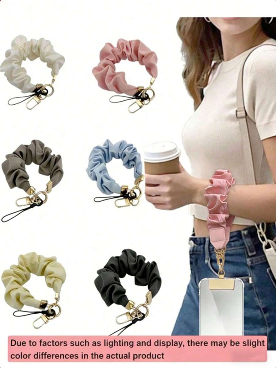 这款时尚百搭的短款手机挂绳防丢防摔，采用通用双头双扣腕带设计，适用于大多数手机壳。它安全可靠，适合女性、男性、青少年、上班族、旅行者等各类人群。是日常通勤、购物和户外活动的理想之选。这款手机配件采用坚固的扣环设计，使其成为必备单品。兼容安卓系统及大多数智能手机，是送给母亲、家人、朋友的生日或节日礼物。