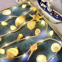 Luces decorativas de cuerda de cáñamo con temática de playa con concha marina cadena de luces náuticas iluminadas por 39 ledes 19 conchas de 6.5 pies alimentadas por batería para verano camping - Blanco - Ver 6