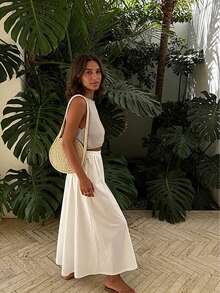 Sylvia 女士夏季基础款极简无袖圆领短款针织背心，面料柔软，休闲舒适，适合海滩、下午茶、约会、音乐节等场合。 - 卡其色 - 查看 4