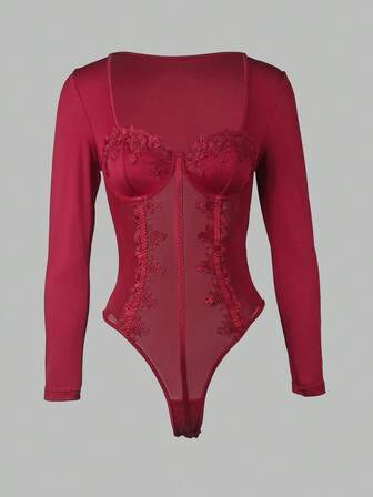 This Fashionable Women's Jumpsuit In Wine Red Features Long Sleeves, A Square Neckline, And Delicate Sheer Mesh Accents That Flatter The Figure.