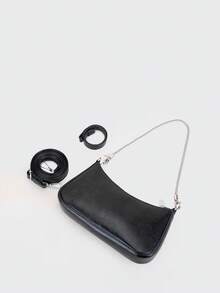 Eine zeitgenössische Tasche in Form eines französischen Baguettes, mit Metallketten-Details. Aus schwarzem PU-Leder gefertigt, bietet diese minimalistische Damen-Umhängetasche einen verstellbaren langen Riemen für das Tragen über der Schulter, was sie ideal für den täglichen Einkauf und ähnliche Anlässe macht.