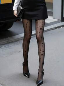 سروال ضيق مطبوع بطراز ياباني للمقاسات الكبيرة، يتميز بتصاميم جرافيكية جريئة ونصوص لإطلالة ملابس الشارع