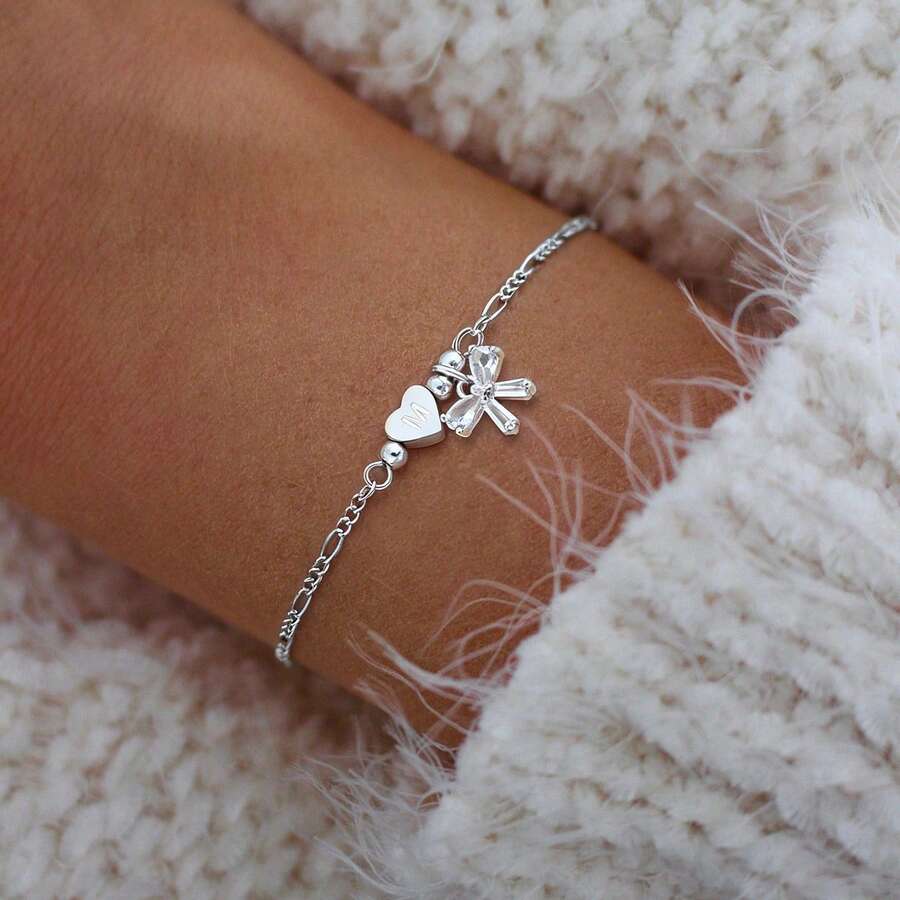 Bộ dây chuyền và vòng tay mặt dây chuyền hình trái tim, chữ cái, nơ pha lê kiểu cổ điển dành cho nữ, chất liệu thép không gỉ. - Bạc - Xem 1