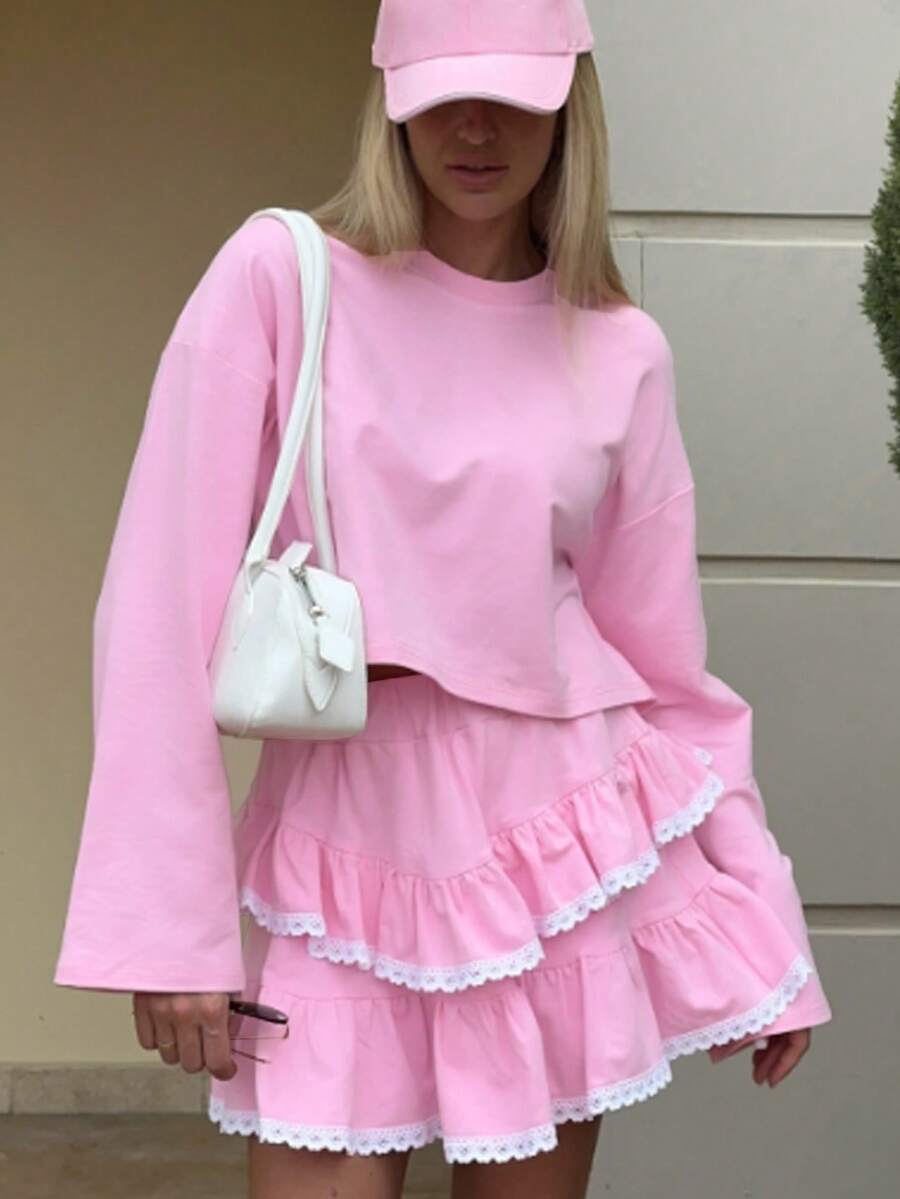 Set elegant pentru femei, casual, versatil, format din 2 piese: top cu mânecă lungă, decolteu rotund, garnitură cu volane și fustă cu volane în straturi, potrivit pentru Halloween, Ajunul Crăciunului, Crăciun, Festivalul Primăverii, ieșiri în oraș, vacanțe la plajă, întâlniri cu prietenii, plimbări casual, divertisment, muncă etc. Materialul asortat este confortabil, design elegant, raport calitate-preț ridicat, potrivit pentru ținute de primăvară și vară. - Roz - Vizualizare 1