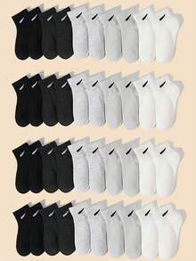 12 paires de chaussettes mi-mollet élastiques de couleur unie noire, blanche et grise pour enfants. Respirantes et absorbantes, conviennent pour le printemps, l'été, l'automne et l'hiver - Multicolore - Voir 5