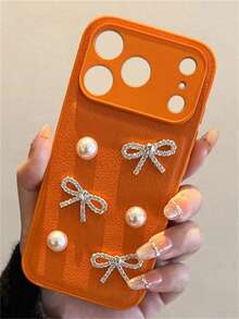 Luxury Shiny 3D Bow Pearl Lychee Pattern Orange Phone Case Compatible With IPhone 17 ProMax 17 Pro 17 16 15 14 13 Pro Max Solid Color Camera Protection Soft Back Cover - Orange - View 3