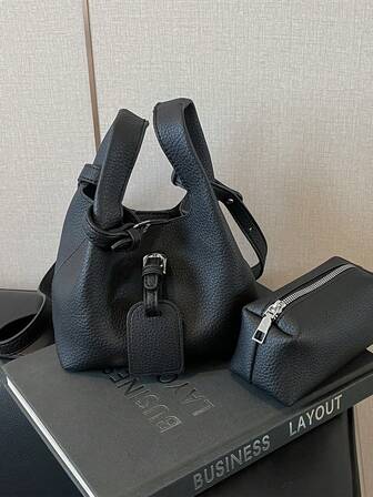 Nischdesign Casual Mångsidig Minimalistisk Mode PU Textur En Axlad Diagonal Crossbody Handväska Hinkväska Tygväska Dam Utomhus Liten Handväska Högkvalitativ Retro Axelväska