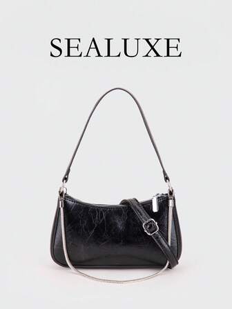 这款现代感十足的包袋造型酷似法式长棍面包，饰有金属链条细节。包身采用黑色PU皮革制成，简约时尚，配有可调节长肩带，可斜挎佩戴，是日常购物及类似场合的理想之选。