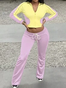 Conjunto deportivo de mujer en color amarillo y morado, que incluye top con capucha y cremallera, y pantalones acampanados con cordón, de estiramiento medio, cómodo y transpirable - Amarillo - Ver 3