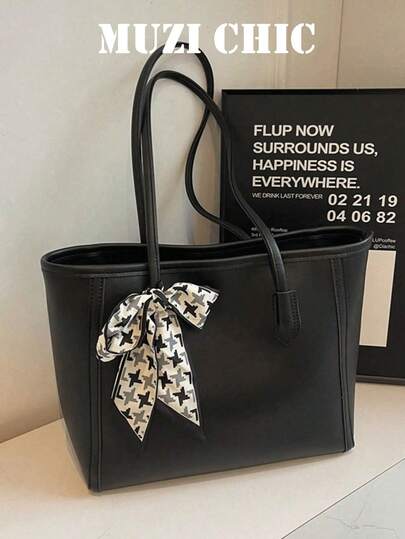 这款时尚新款大容量纯色手提包采用PU面料制成，并饰有蝴蝶结，使其既时尚又实用。它特别适合日常使用、购物、外出和旅行，也是馈赠亲朋好友的理想礼物。