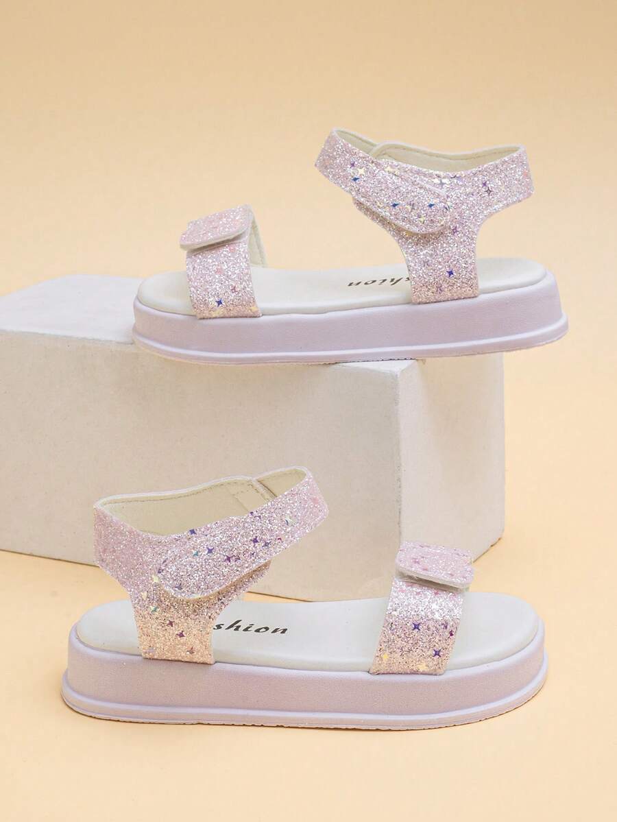 This Children's Sandal Exudes A Sweet And Adorable Vibe. The Pink Glitter And Star Accents, Along With The Thickened Sole Design, Not Only Protect The Feet But Also Look Sweetly Lively. This Flat Sandal Can Be Easily Paired With Various Summer Outfits. - Pink - View 1