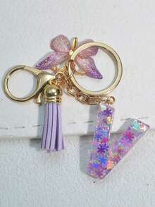 Chaveiro com inicial (1 unidade), pingente de floco de neve em resina, acessório decorativo para bolsas femininas, pingente de borboleta, presente. - Roxa - Ver 9
