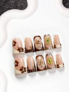 10片装优雅复古美甲贴纸套装，手绘法式美甲图案，金色十字形圆片，手工浅粉色五瓣花（镶嵌金色水钻），纯色水波纹，棕色五瓣花朵美甲贴纸，银色饰边，白色指甲油，包含美甲工具（1个果冻贴纸+1个指甲锉）美甲用品 - 彩色 - 查看 14
