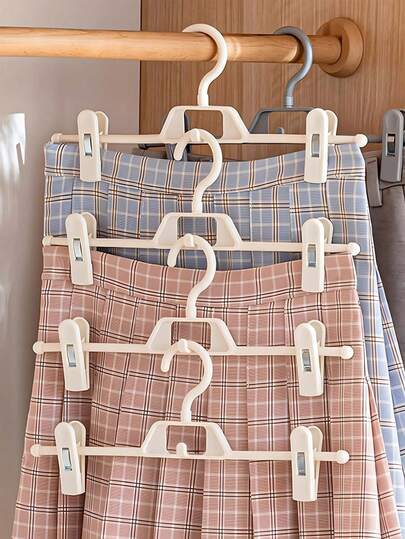 1 st/5 st roterande byxhängare i plast, sömlös halkfri klämma, förvaringsställ för hemmet, klädhängare för rumsinredning, klämma, organiseringsställ, klädklämma, ställ, kjolställ, klädförvaring, lämplig för garderobsorganisation, hem - platsbesparande lyxig klädhängare, viktig för resor och hemmet