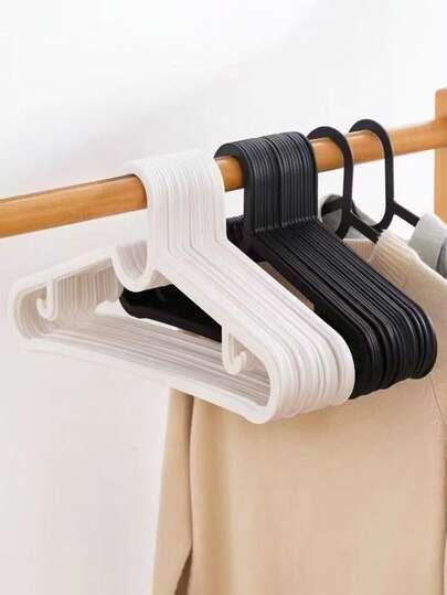 40/20/10 piezas Set de perchas de plástico ultra delgadas antideslizantes, estantes de secado multifuncionales para tienda de ropa, diseño de moda en blanco y negro, maximiza el espacio del armario, perchas ranuradas resistentes que aseguran un almacenamiento de la ropa, duraderas, de alta capacidad de carga, ideales para la lavandería, adecuadas para abrigos, trajes, camisas y vestidos de adultos, esenciales para la organización de vacaciones