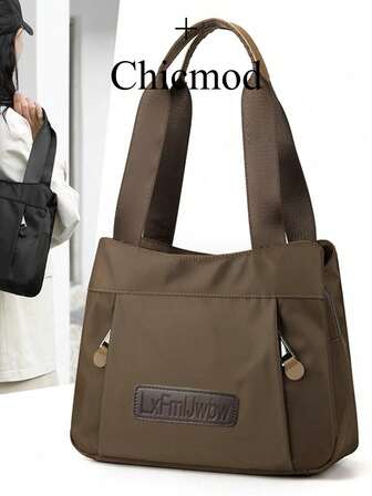 时尚女士单肩包，手提包，大容量，方形款式，多口袋，尼龙材质，防刮耐用，适合购物、约会、郊游、通勤，优雅休闲别致的咖啡色单肩包。适合购物、钱包、购物、年轻女性、大学生、新手、白领。非常适合办公室、大学、工作、商务、通勤、户外活动、旅行和野餐。