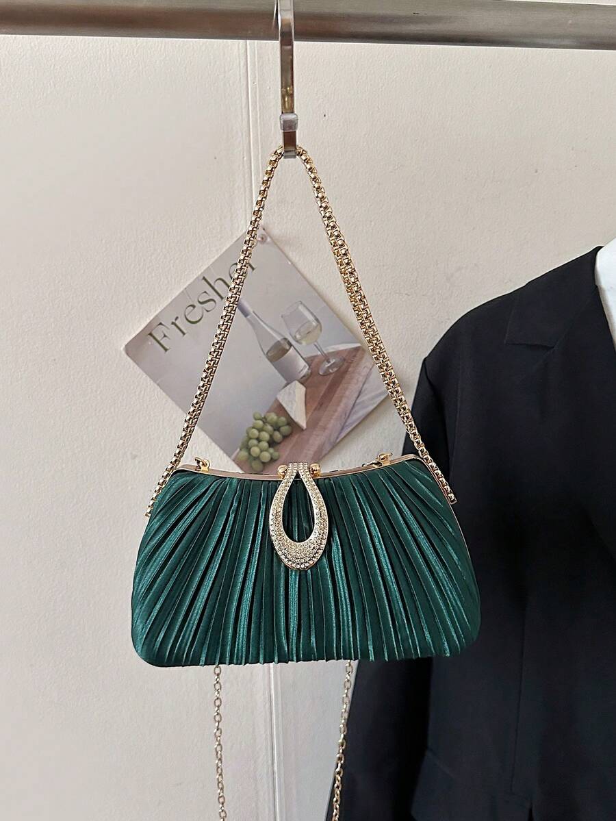 BAILEE 这款闪亮的一体式包包，镶嵌着闪亮的水钻，时尚奢华，配有金色手柄和金色链条，采用亚克力材质，搭扣闭合。可作为女士晚宴包、手拿包或斜挎包使用，适合购物、聚会、派对、婚礼、鸡尾酒会和送礼等场合。