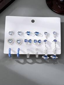 9对可爱少女心形、蝴蝶结、小行星造型耳环套装，适合女性日常佩戴或作为礼物送给朋友