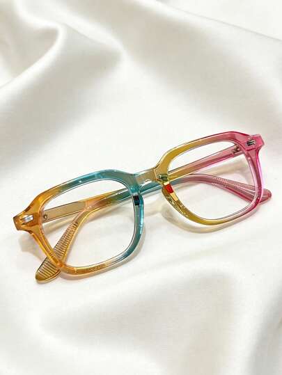 A Pair Of New, Lightweight, Crystal-Clear Rainbow-Colored Frame Glasses With A Simple Square Design For Teenagers.
