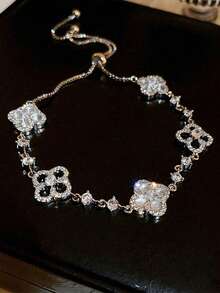 1 件时尚锆石四瓣花手链，可调节，适合女性，轻巧奢华优雅风格配饰，适合女性派对、约会、度假，送给她的特别礼物