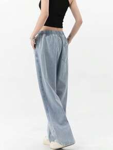 Pantalones rectos de estilo vintage americano de inspiración retro. Vaqueros casuales de pierna ancha para todas las estaciones. Vaqueros rectos de pierna ancha con cintura elástica y cordón ajustable. Pantalones casuales de estilo hongkonés con bolsillos. - Celeste - Ver 6