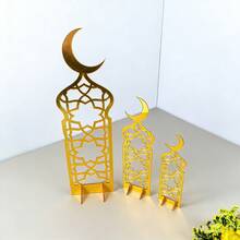 OUTANA مجموعة ديكور مكتبي هلال القمر لهذا الموسم (1/3 قطع) تتميز بنقوش مستوحاة من الإسلام بأسلوب زخرفي احتفالي. بتصميمه الحديث المميز، إنه مثالي للعرض على المكاتب والرفوف. - متعدد الألوان - مشاهدة 6